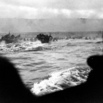 LCVP landing craft put troops ashore on "Omaha" Beach on "D-Day." (6 June 1944). Source: National Archives, #26-G-2337.