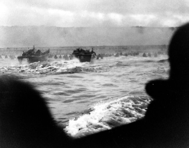 LCVP landing craft put troops ashore on "Omaha" Beach on "D-Day." (6 June 1944). Source: National Archives, #26-G-2337.