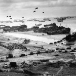 Landing ships putting cargo ashore on Omaha Beach. (June 1944). Source: U.S. Coast Guard Collection, Naval Historical Center, 26-G-2517.