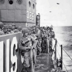 Group of U.S. soldiers from the 359th Infantry Regiment, 90th Infantry Division bound for Utah Beach on LCI(L)-326 on D-Day afternoon. Source: U.S. National Archives, # 26-G-2402.