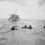 Troops wading ashore. (June 6, 1944). Source: Imperial War Museums, B 5092.