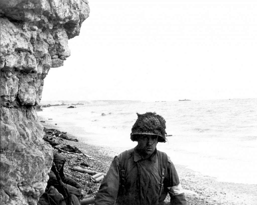 A medic at Omaha Beach, France. (June 6, 1944). Source: Center of Military History.