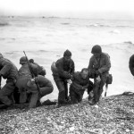 American landing party helping out on Omaha Beach, France. (June 6, 1944). Source: Center of Military History.