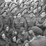 Men of 4 Commando, 1st Special Service Brigade, being briefed by Lt Col R. Dawson just before embarking for Normandy. (June 1944). Source: Imperial War Museums, B 5098.