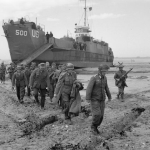 German POWs disembarking from LCI(L)-500 on 1 of the Gold area beaches. (June 6, 1944). Source: Imperial War Museums, B 5256.