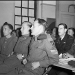 Glider pilots of 6th Airborne Division and RAF crews are briefed at RAF Harwell for the D-Day invasion. (June 5, 1944). Source: Imperial War Museums, # H 39062.