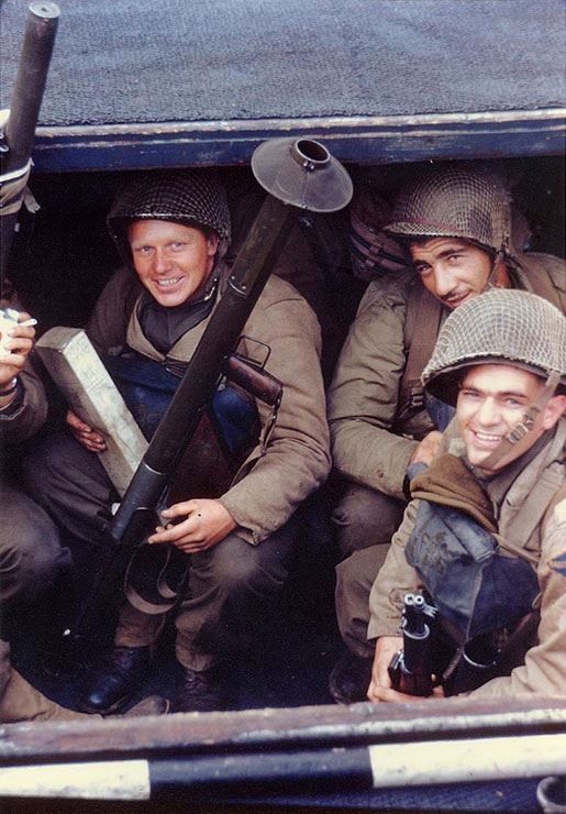 U.S. Army Rangers awaited the invasion signal in a landing craft in an English port; note the bazooka and the M1 Garand rifles. (Early June 1944). Source: U.S. National Archives, # USA C-739.