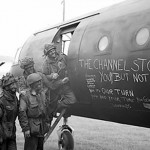 British airborne troops admiring the graffiti chalked on the side of their Horsa Mk I glider. (June 6, 1944). Source: Imperial War Museums, # 4700-37 H 39178, Photographer: Malindine.