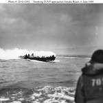 Smoking LCVP approaches Omaha Beach. (June 6, 1944). Source: U.S. National Archives, # 26-G-2342.