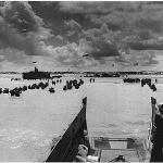 U.S. troops landing at Normandy on D-Day. (June 6, 1944). Source: U.S. National Archives, # 195567.