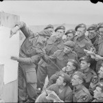 Men of 22nd Independent Parachute Company, 6th Airborne Division being briefed for the invasion. (June 4-5, 1944). Source: Imperial War Museums, # H 39089.