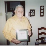 A veteran with his award. Source: Veterans History Project, Gale E. Garman.