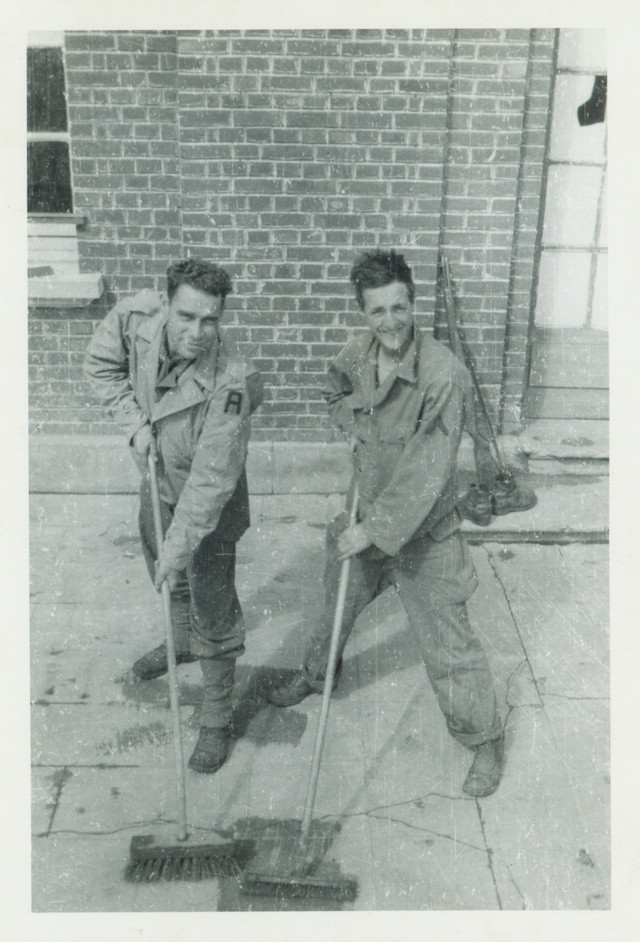 Scrubbing sidewalks in France. (June 1944). Source: Veterans History Project, Bernard Horowitz.