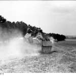 German Jagdpanther tank destroyer traveling across a field in France during the Allied invasion. (June 1944). Source: German Federal Archive, Bild 101I-721-0397-18.