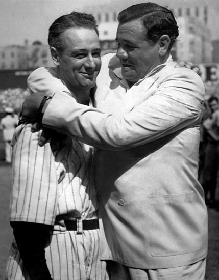 Babe Ruth giving his old teammate and friend Lou Gehrig a hug after Gehrig's farewell speech at Yankee stadium. (July 4, 1939). Source: Wikipedia.