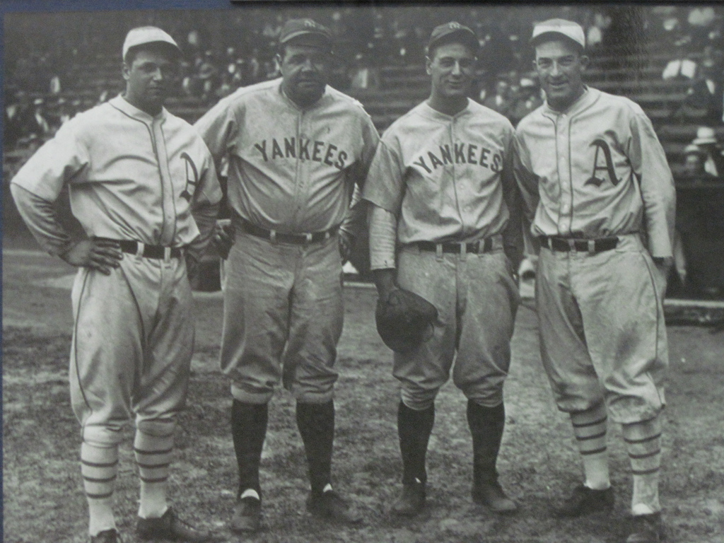 Jimmie Foxx and Mickey Cochrane, members of the Oakland Athletics, pose for a picture with New York Yankees Babe Ruth and Lou Gehrig. From left to right: Foxx, Ruth, Gehrig, Cochrane. Source: Wikipedia.