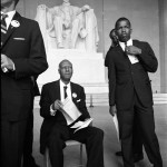 A. Philip Randolph, seated, and John Lewis, standing in front of Lincoln Memorial during the March. (Aug. 28, 1963). Source: LOOK Magazine Photograph Collection, Library of Congress #042.00.00. © Stanley Tretick.