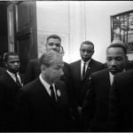Organizers of the March on Washington, from left: Walter P. Reuther, Roy Wilkins, John Lewis, Rabbi Joachim Prinz, Whitney Young, Floyd McKissick, & Martin Luther King, Jr., enter congressional chambers to officially present demands. (Aug. 28, 1963). Source: LOOK Magazine Photograph Collection, Library of Congress #044.00.00. © Stanley Tretick.