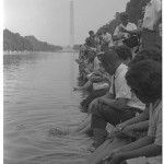 Demonstrators sit with their feet in the Reflecting Pool. Photographed by Warren K. Leffler. (Aug. 28, 1963). Source: Library of Congress #LC-DIG-ds-00834.