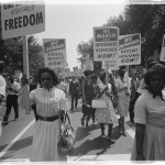 Women carrying signs for equal rights, integrated schools, decent housing, & an end to bias. Photographed by Warren K. Leffler. (Aug. 28, 1963). Source: Library of Congress #LC-DIG-ppmsca-03128.
